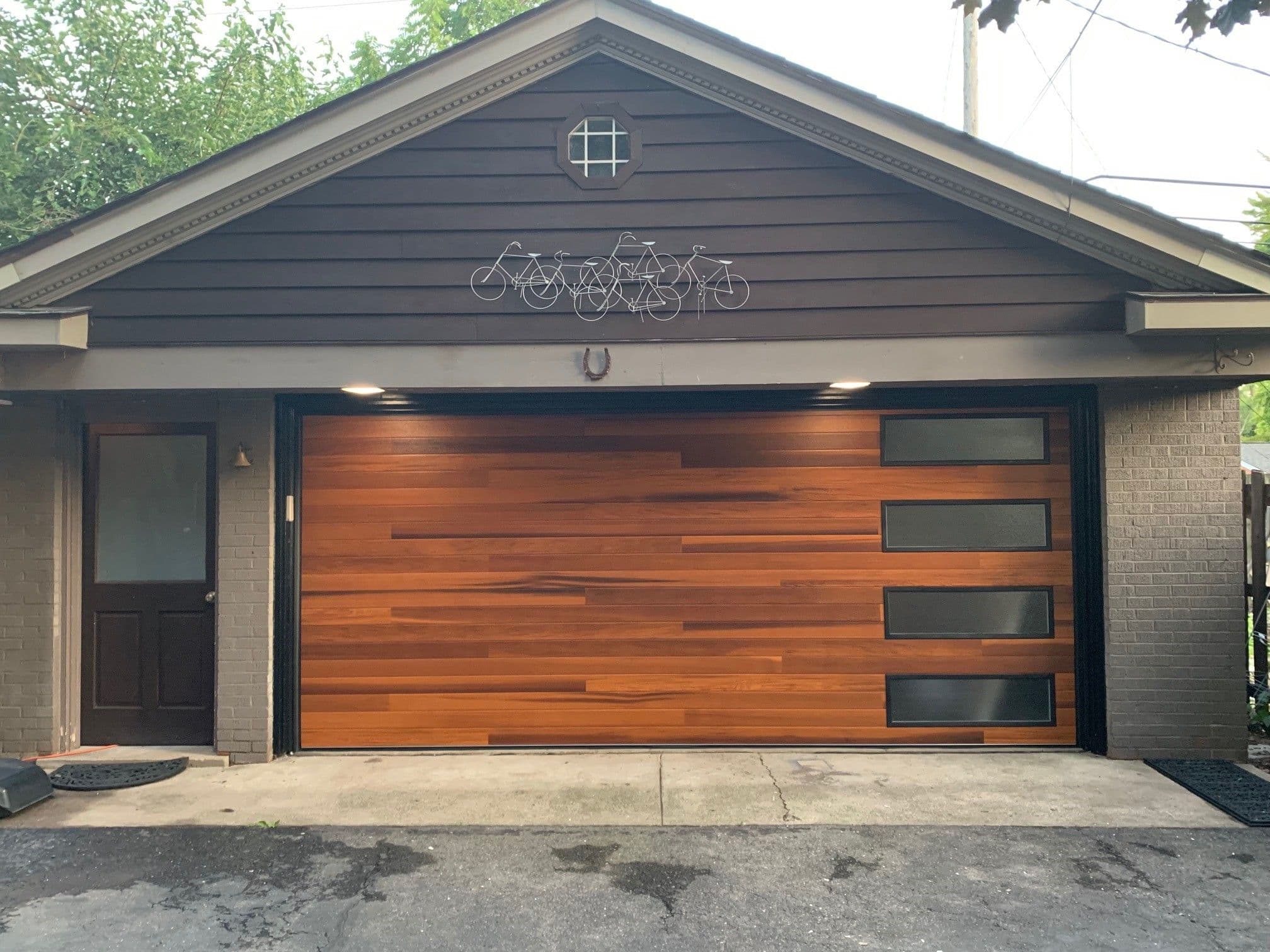 Project Luxury Wood Plank Garage Doors with Glass Inserts image