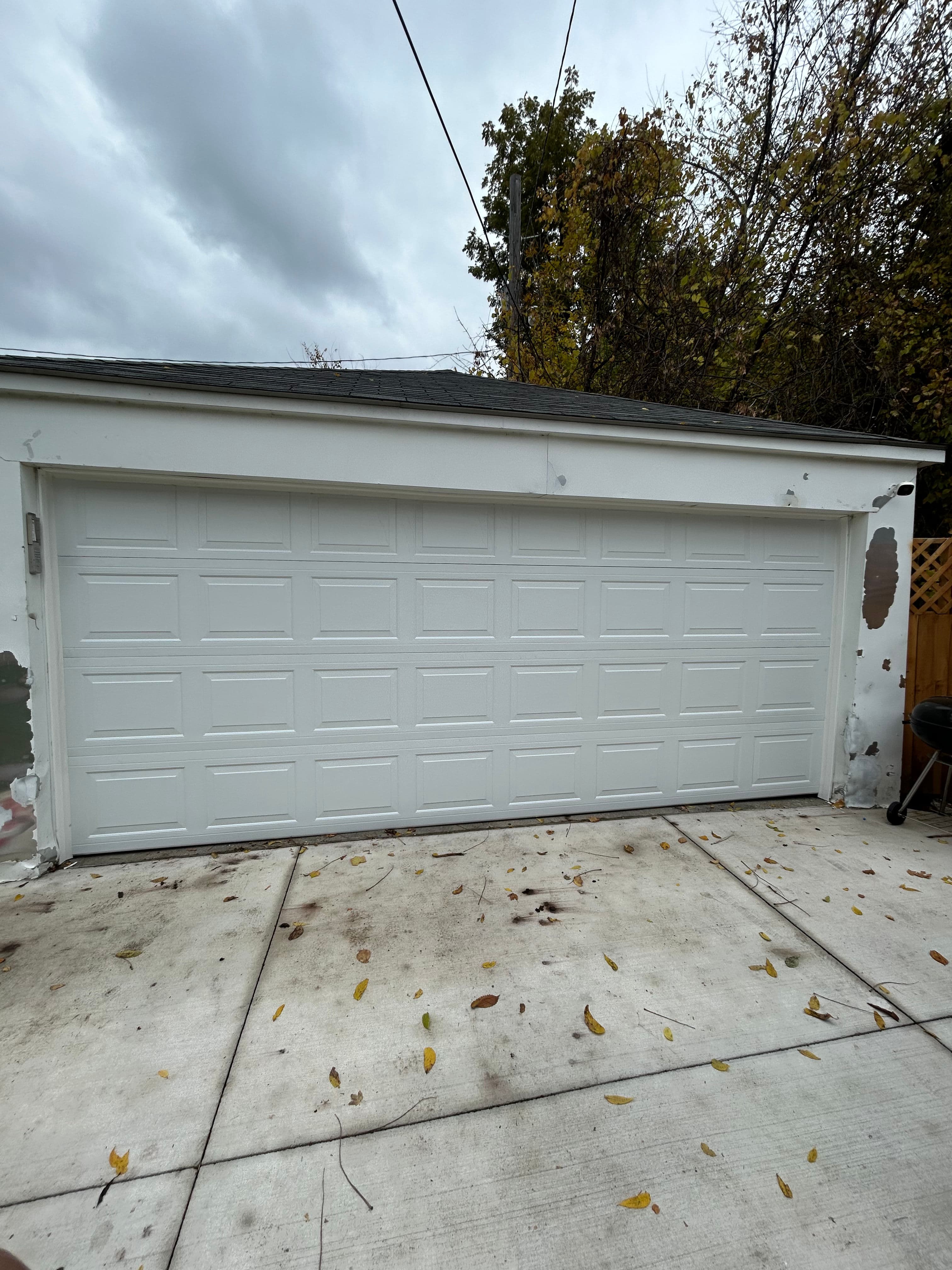 Project New 16x7 Non-Insulated Garage Door Installation in Detroit image