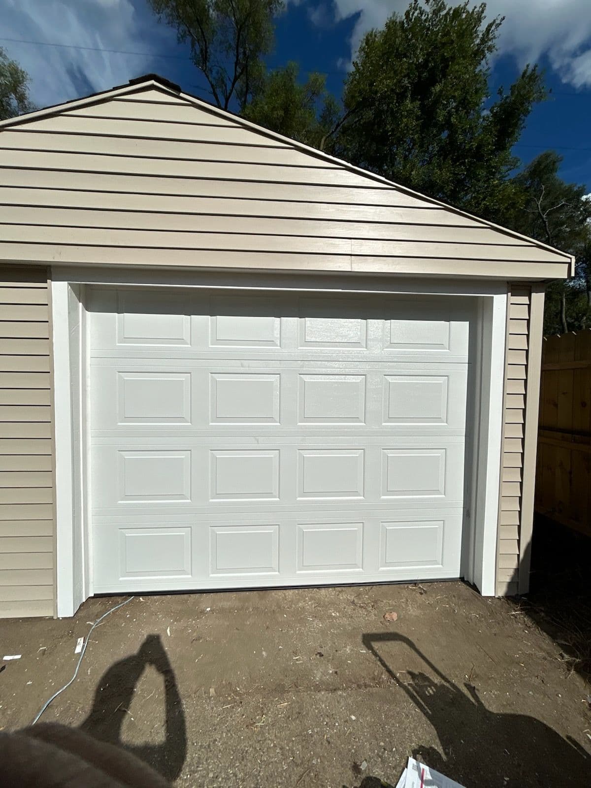 Project Sleek White Sectional Garage Door Installation image